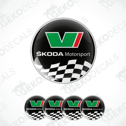 Set of four vinyl decals with polyurethane coating featuring the Skoda Motorsport logo in green, white, and red on a black background with a checkered pattern.