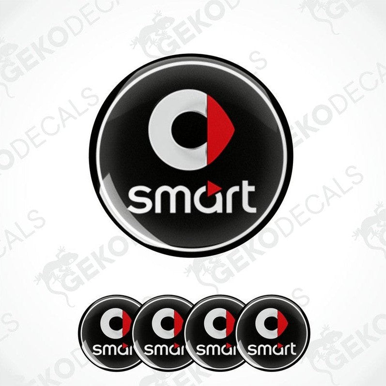 A set of four round car decals with the smart car logo in black, red, and white colors.