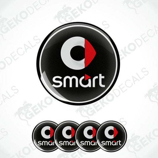A set of four round car decals with the smart car logo in black, red, and white colors.