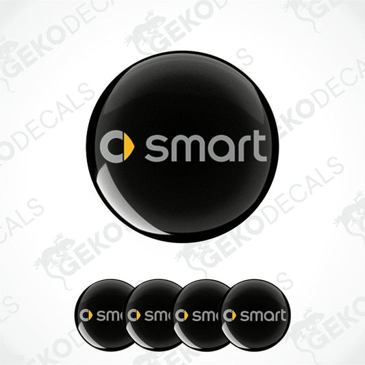 A set of four black vinyl stickers with a yellow 'SMART' logo design.
