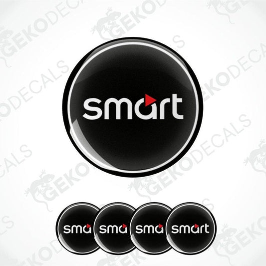 Set of four black vinyl decals with the 'smart' logo in white, designed for vehicle wheels and cars.