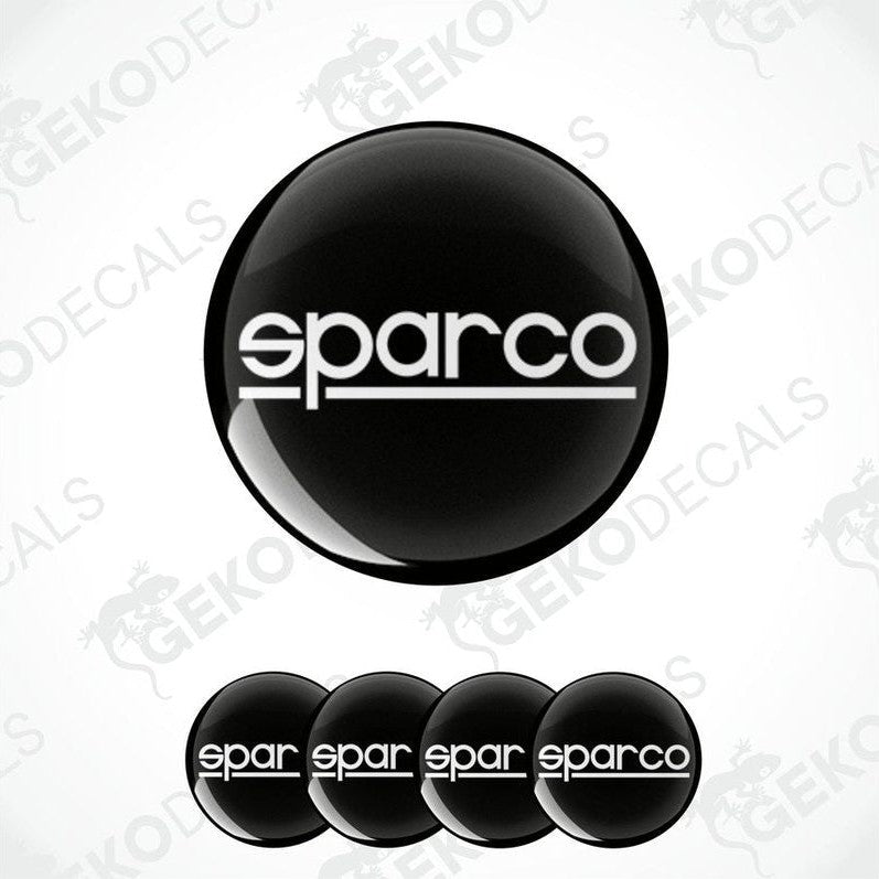 A set of four black vinyl stickers with the SPARCO brand logo on them.