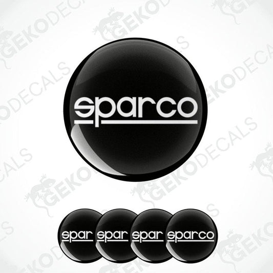 A set of four black vinyl stickers with the SPARCO brand logo on them.