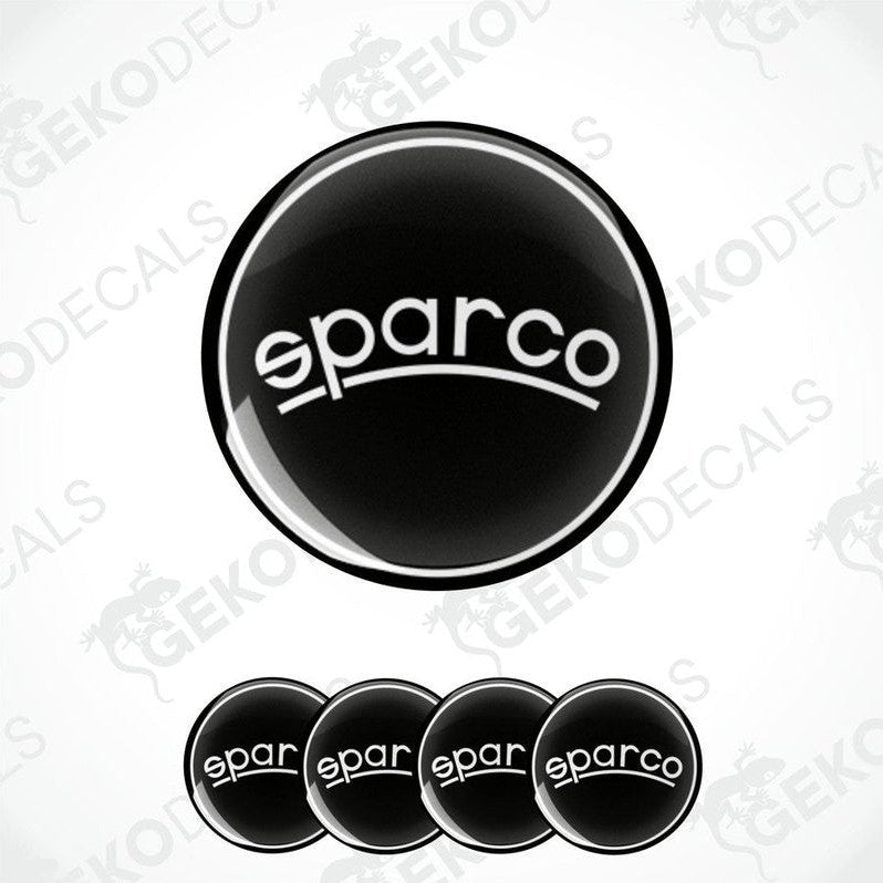 A set of four black vinyl stickers with the SPARCO brand logo on them.