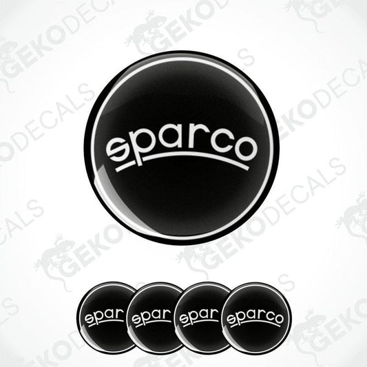 A set of four black vinyl stickers with the SPARCO brand logo on them.