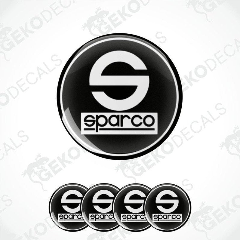 A set of four black vinyl stickers with the SPARCO brand logo on them.