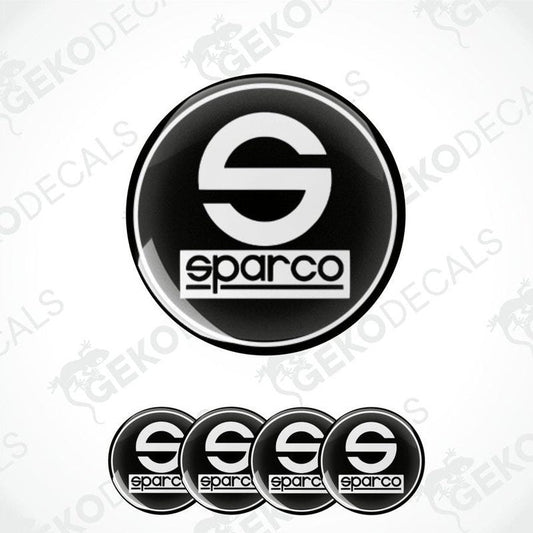 A set of four black vinyl stickers with the SPARCO brand logo on them.