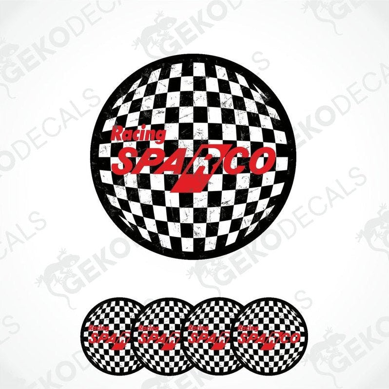 A set of vinyl stickers with a checkered black and white pattern and the text 'SPARCO' displayed prominently in the center.