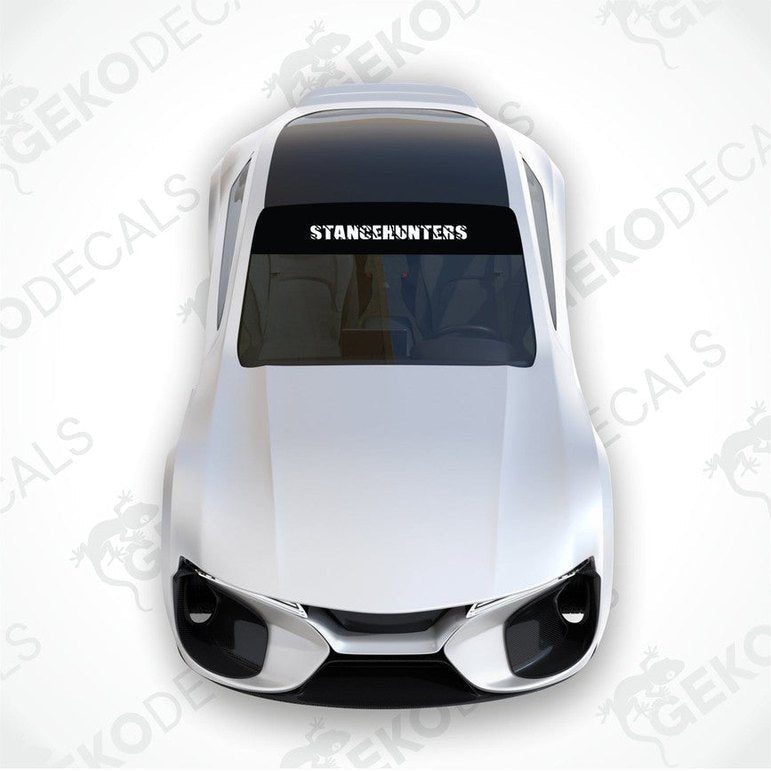 Black car windshield sun visor with white text STANCEHUNTERS