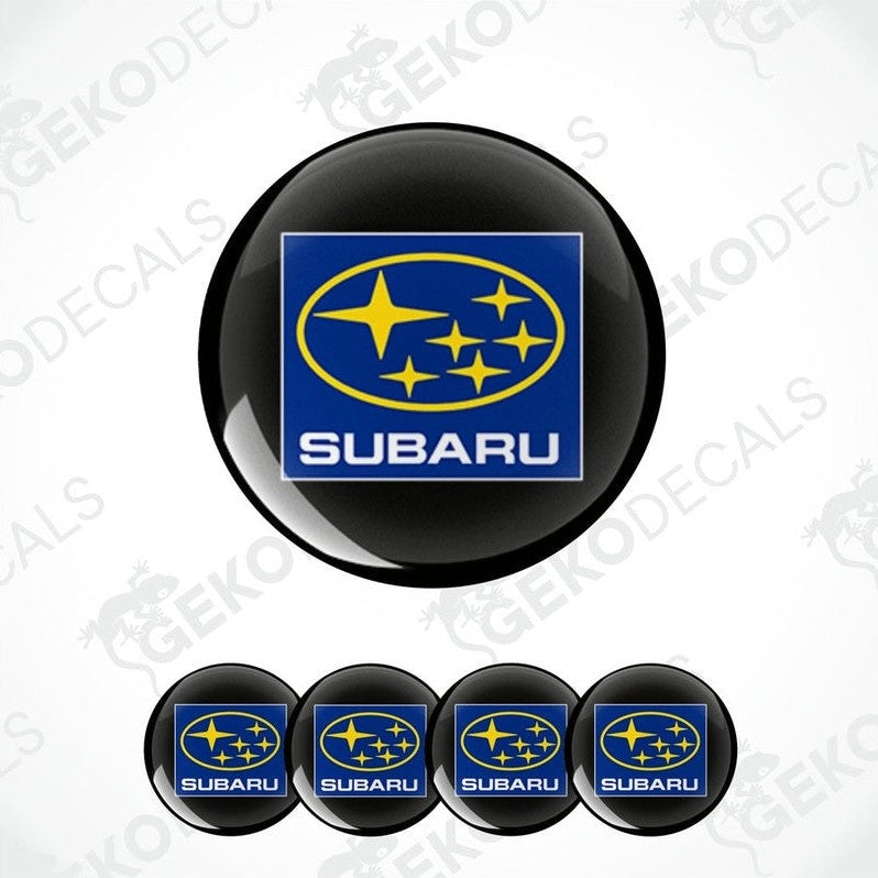 A set of four Subaru branded vinyl decals with a polyurethane coating, displayed on a white background.