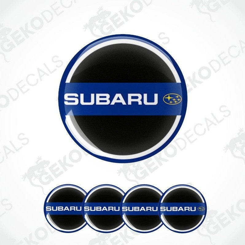 A set of four blue vinyl stickers with the word 'SUBARU' and a logo depicting a circle with a line through it, indicating a car brand.