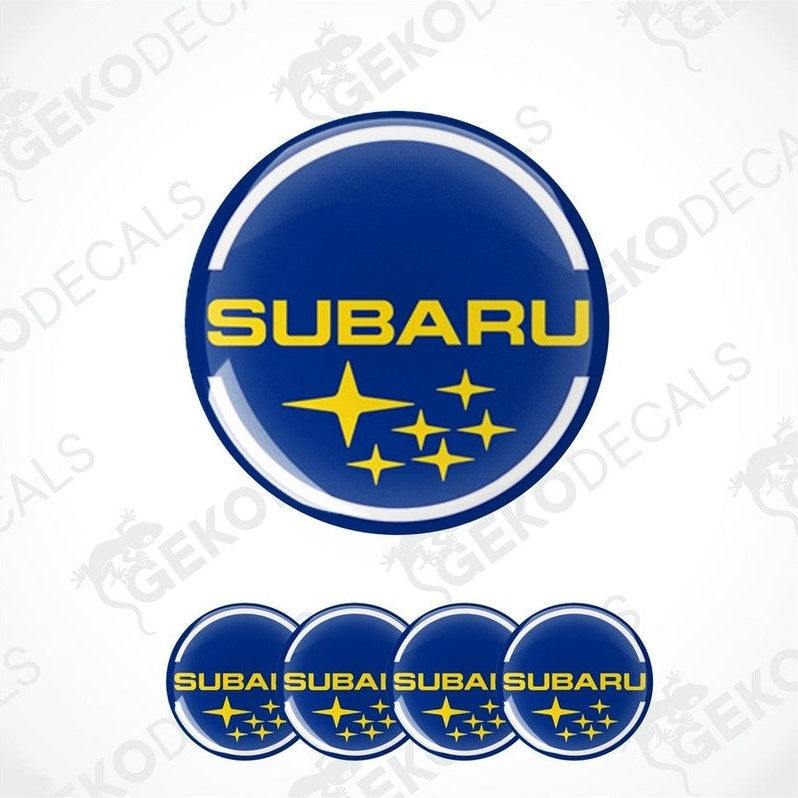A set of Subaru branded vinyl decals with a blue background and yellow text and stars.