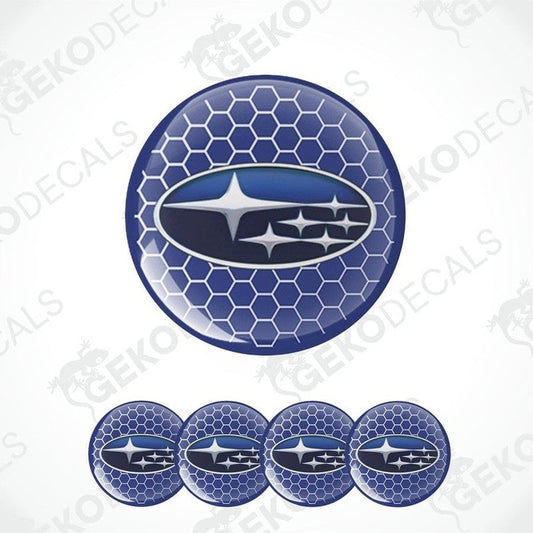 A set of four blue vinyl stickers with a geometric pattern and the Subaru brand logo in the center.