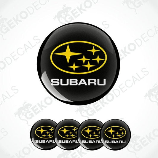 A set of four black vinyl stickers with the SUBARU brand logo and stars in yellow.