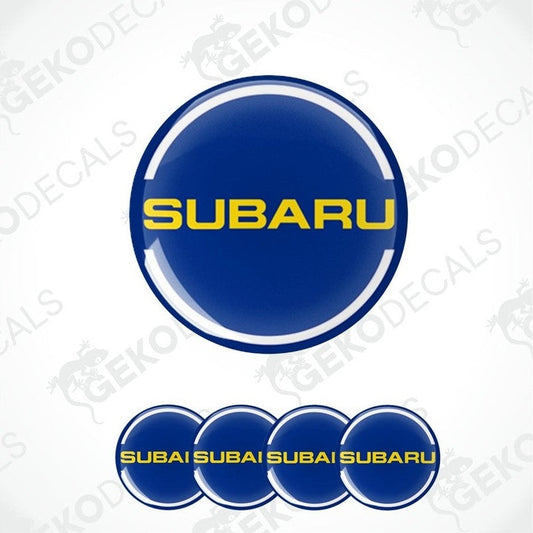A set of four blue vinyl stickers with the word yellow 'SUBARU' 