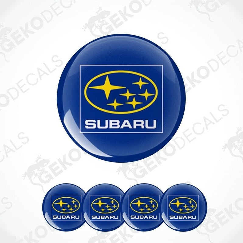 A set of Subaru branded vinyl decals with a polyurethane coating, presented in various sizes suitable for vehicle wheels and caps.