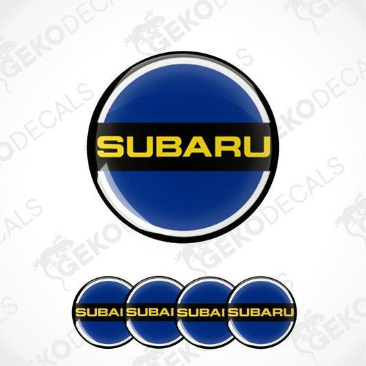 A set of Subaru branded vinyl decals, predominantly blue with white and yellow accents, designed for vehicle wheels and branding purposes.