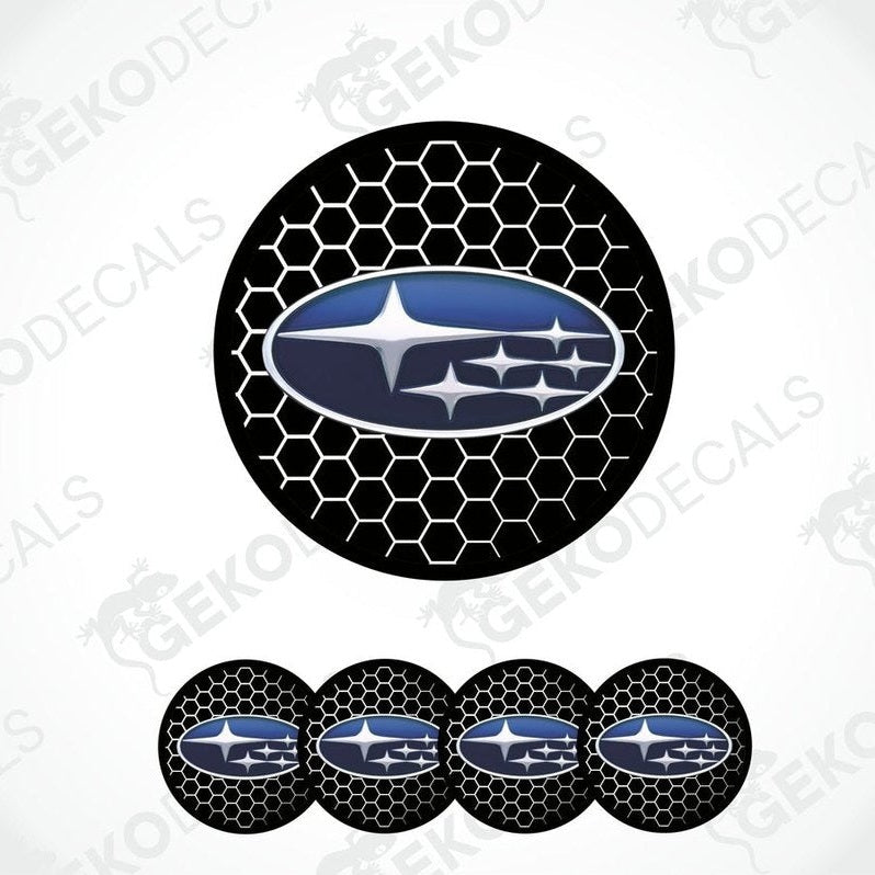 A set of four black vinyl stickers with a Subaru logo and a geometric pattern design.