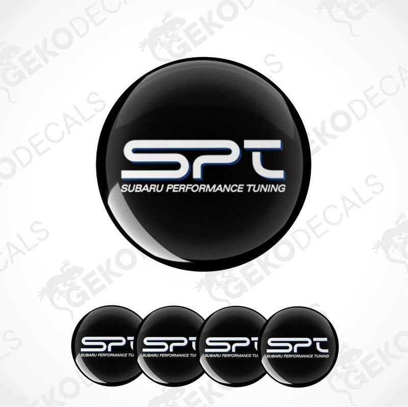 A set of black round car decals with the text 'SPT SUBARU PERFORMANCE TUNING' in white.
