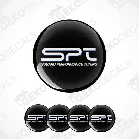 A set of black round car decals with the text 'SPT SUBARU PERFORMANCE TUNING' in white.