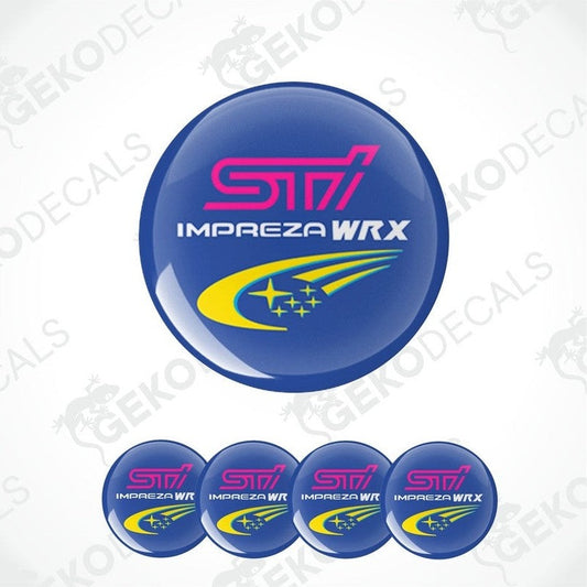 A set of four blue vinyl stickers with the text 'SUBARU STI IMPREZA WRX' and associated logos and graphics.