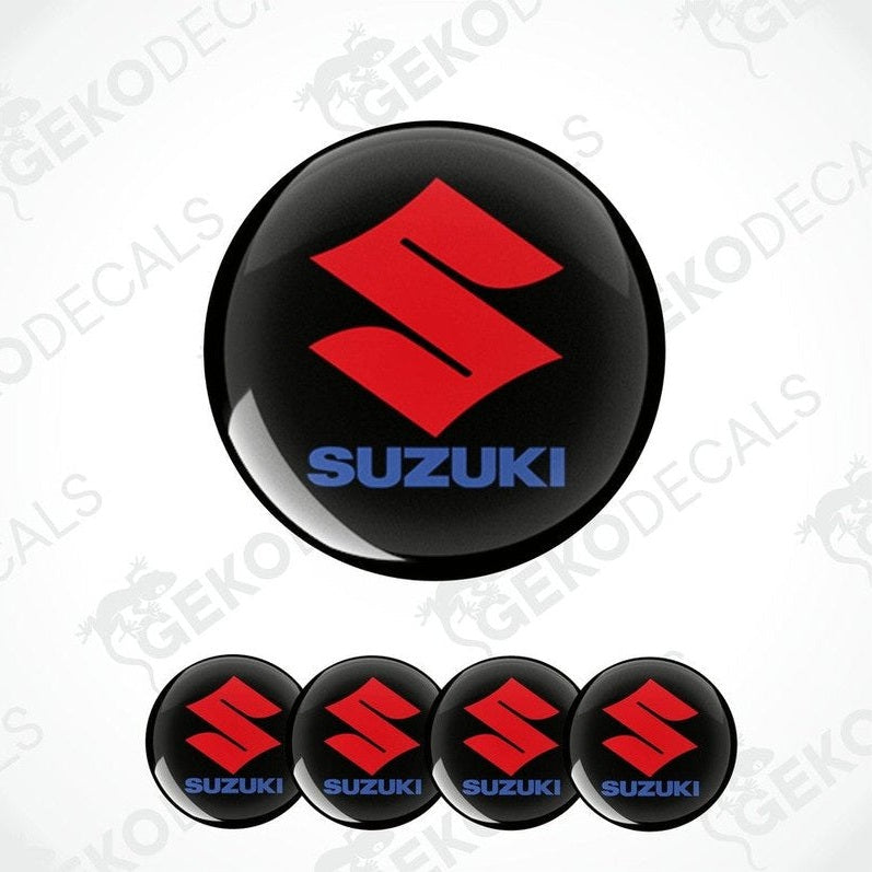 A set of four red and blue vinyl stickers with the word 'SUZUKI' printed on them, designed for use as car decals.
