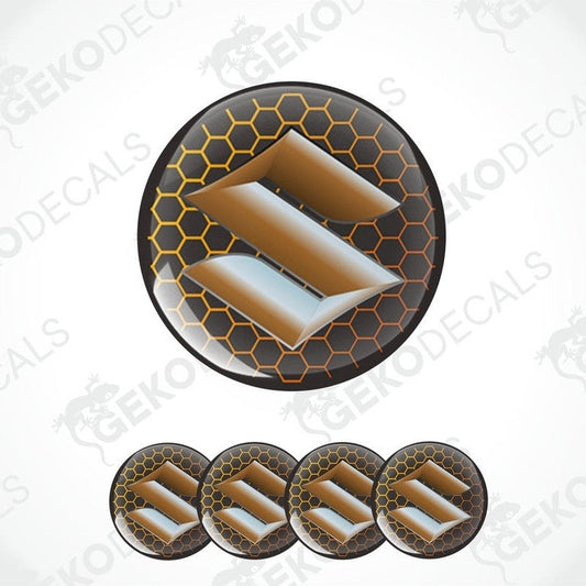 A set of four round vinyl decals with the letter 'SUZUKI' in the center, predominantly in orange and black colors, with a honeycomb pattern around the 'SUZUKI'.