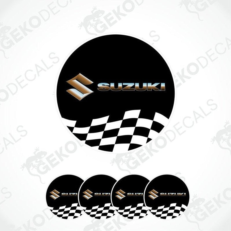 A set of four black vinyl stickers with the SUZUKI brand logo and a checkered pattern.