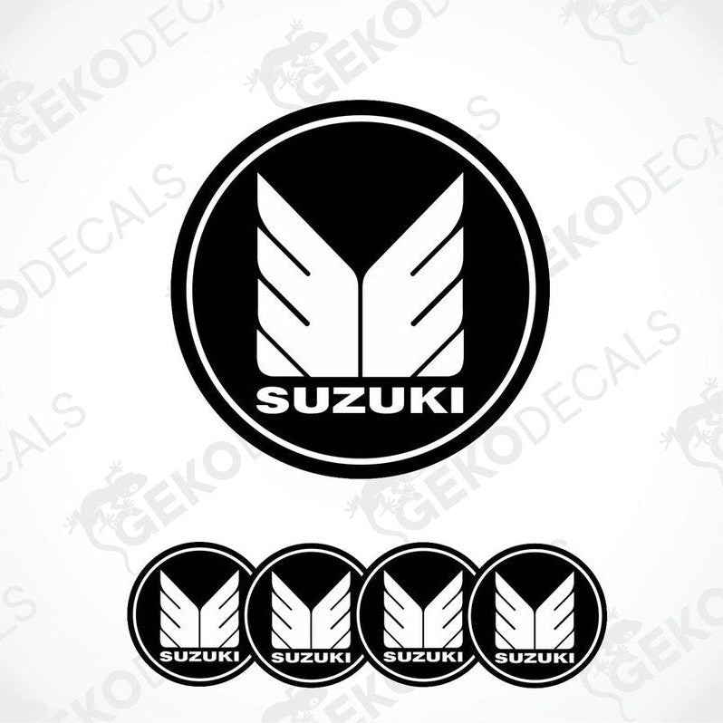 A set of four black vinyl stickers with the SUZUKI brand logo.