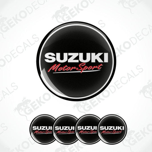 A set of four black vinyl stickers with the text 'SUZUKI MOTORSPORT' in red and white.