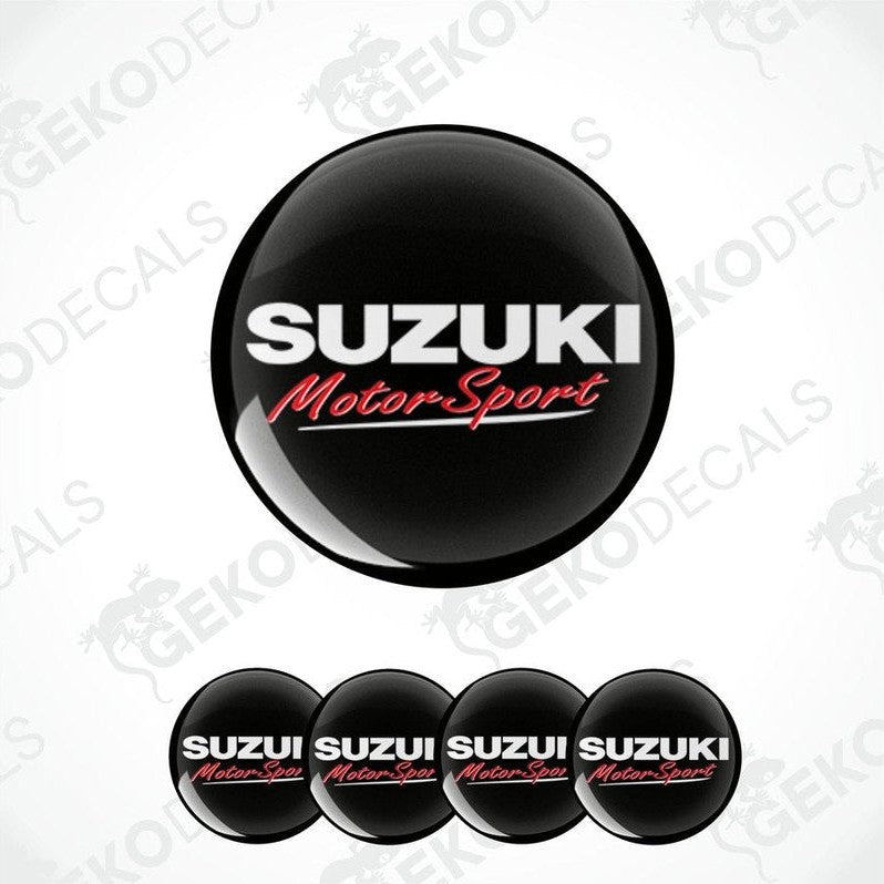 A set of four vinyl decals with polyurethane coating, featuring the 'Suzuki MotorSport' logo in black, white, and red colors.