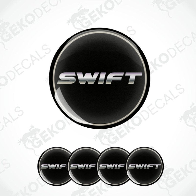 A set of black vinyl decals with the text 'SWIFT' on them, typically used as car wheel caps or stickers.
