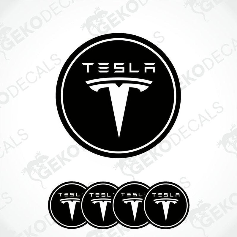 A set of four black vinyl stickers with a Tesla logo on each.