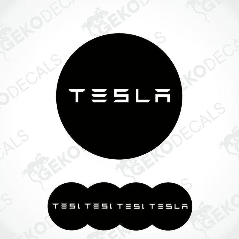 Set of four black and white vinyl decals with the TESLA logo, displayed on a white background.