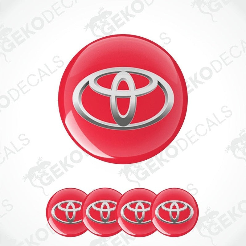A set of four red vinyl decals with the TOYOTA logo, displayed on a white background.