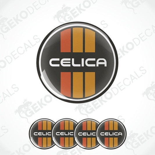 A set of round car decals with the text 'CELICA' on them, featuring a black background with orange and red stripes.