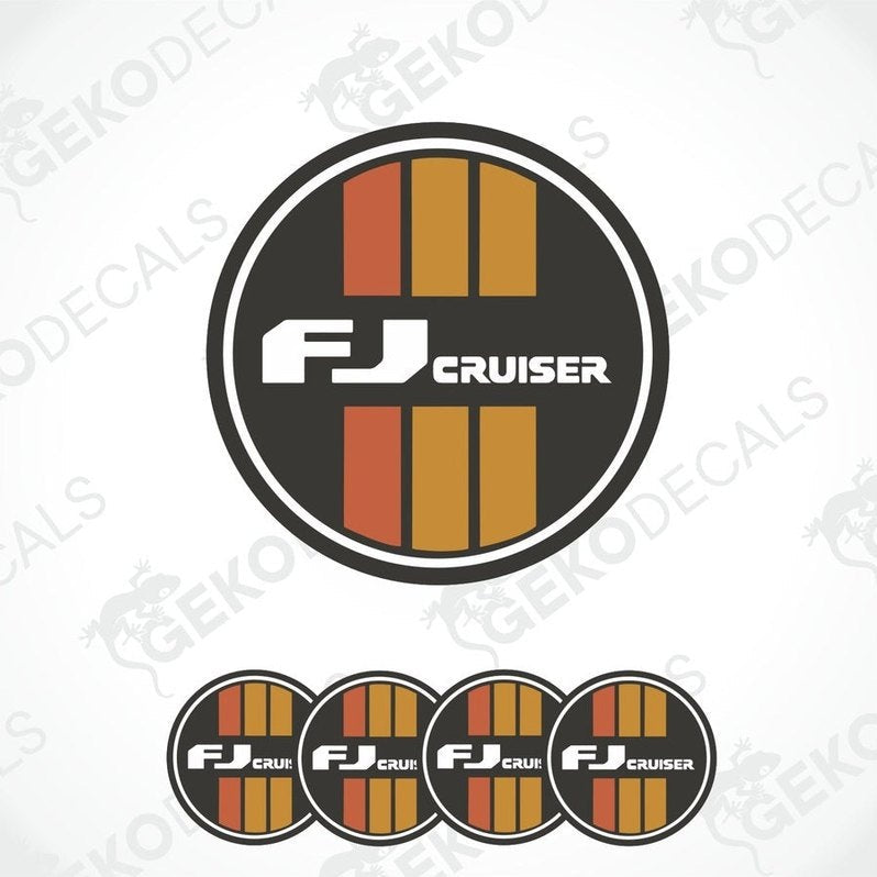 A set of round car decals for a TOYOTA FJ CRUISER, featuring the vehicle's name in white lettering with orange and gray stripes on a black background.