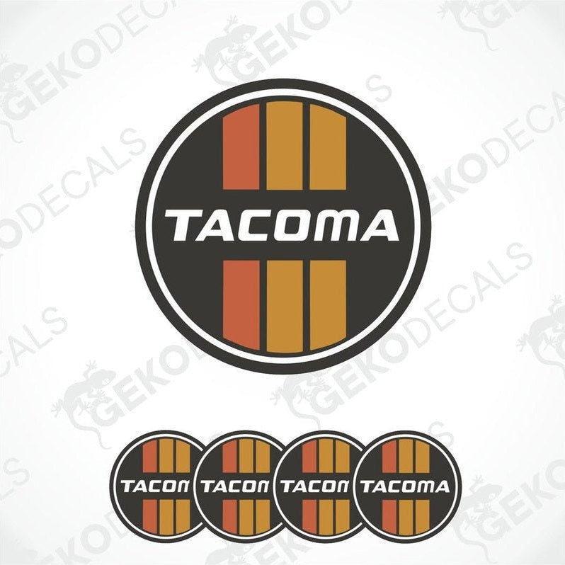 A set of round car decals with the text 'TACOMA' on them, displayed in a vertical arrangement.