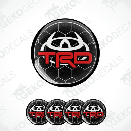 A set of four black, red, and white vinyl decals with the TOYOTA TRD logo.