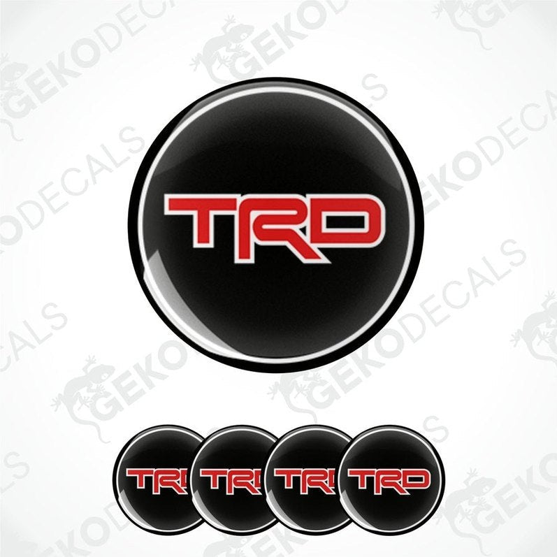 A set of black, red, and white vinyl decals with the TRD logo, designed for use on vehicles.