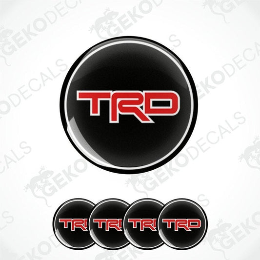 A set of black, red, and white vinyl decals with the TRD logo, designed for use on vehicles.