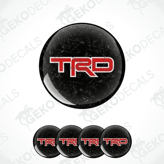 A set of black, red, and white vinyl decals with the TRD logo, designed for use on vehicles.