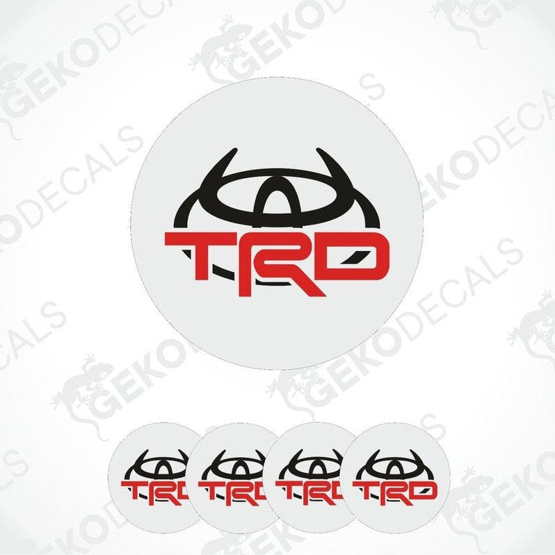A set of four vinyl decals with the TOYOTA  TRD logo, designed for use on a vehicle's wheels.