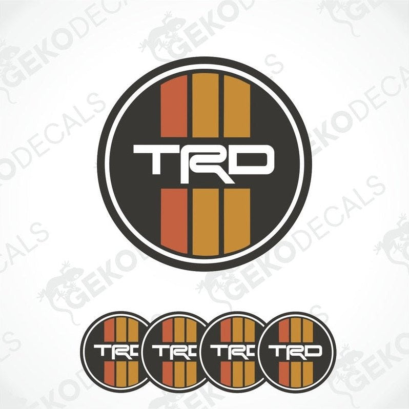 A set of four black, red, and white vinyl stickers with the letters 'TRD' in the center.