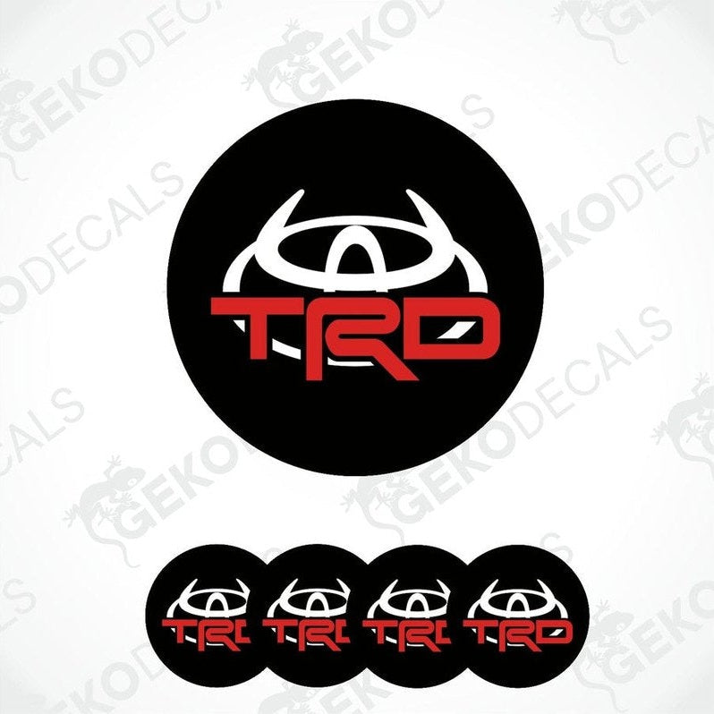 A set of four black, red, and white vinyl decals with the TOYOTA TRD logo.