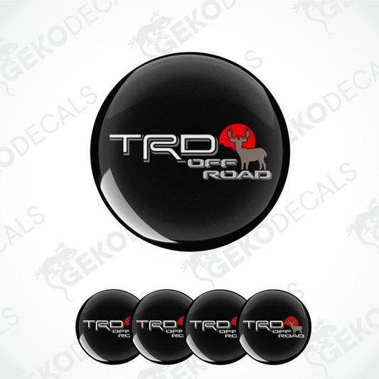 A set of four black vinyl stickers with the text 'TRD OFF ROAD' and a graphic of a bull's head design, arranged in a dome shape.