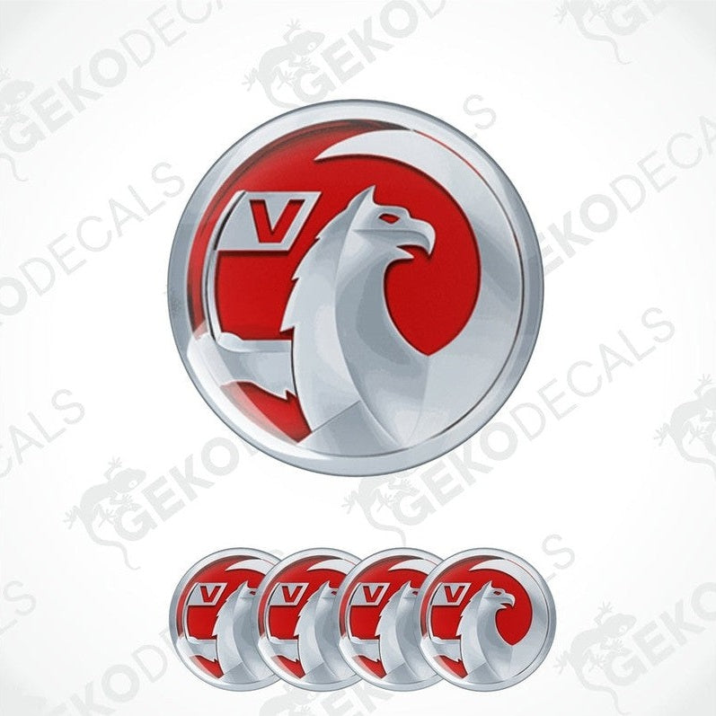 A set of four Vauxhall branded vinyl stickers with a silver and red design.