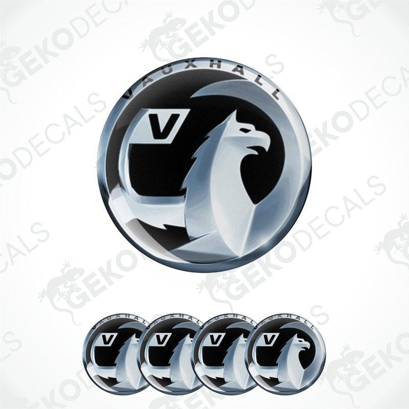 A set of four silver-colored Vauxhall brand vinyl stickers with a polyurethane coating, displayed on a white background.