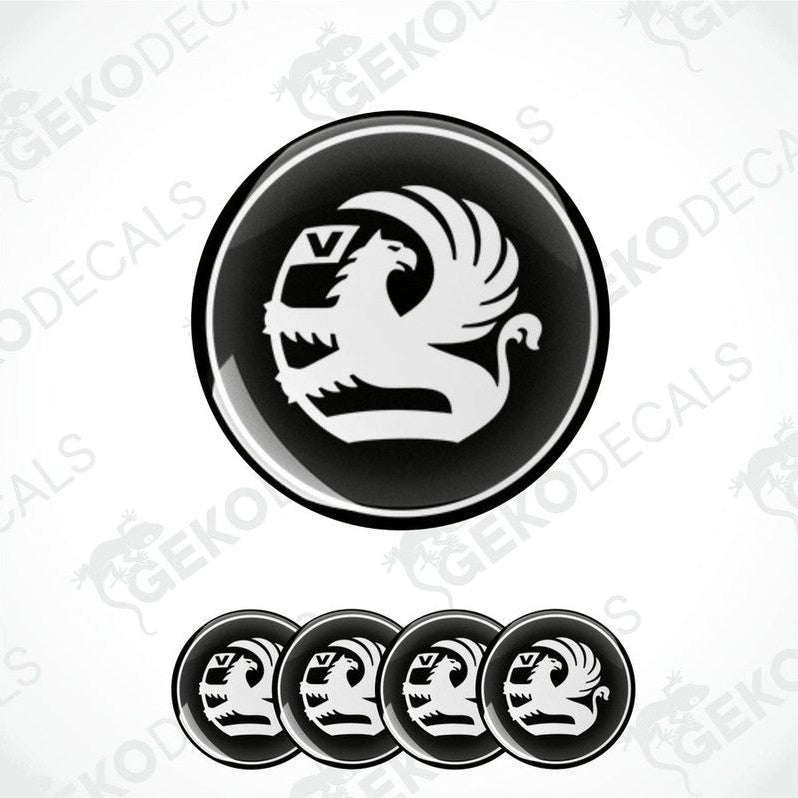 A set of black and white vinyl decals with a bird design, intended for use as car wheel decals.