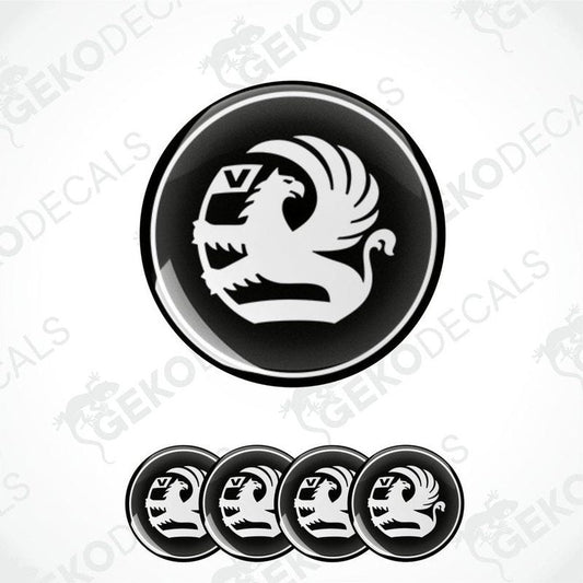 A set of black and white vinyl decals with a bird design, intended for use as car wheel decals.